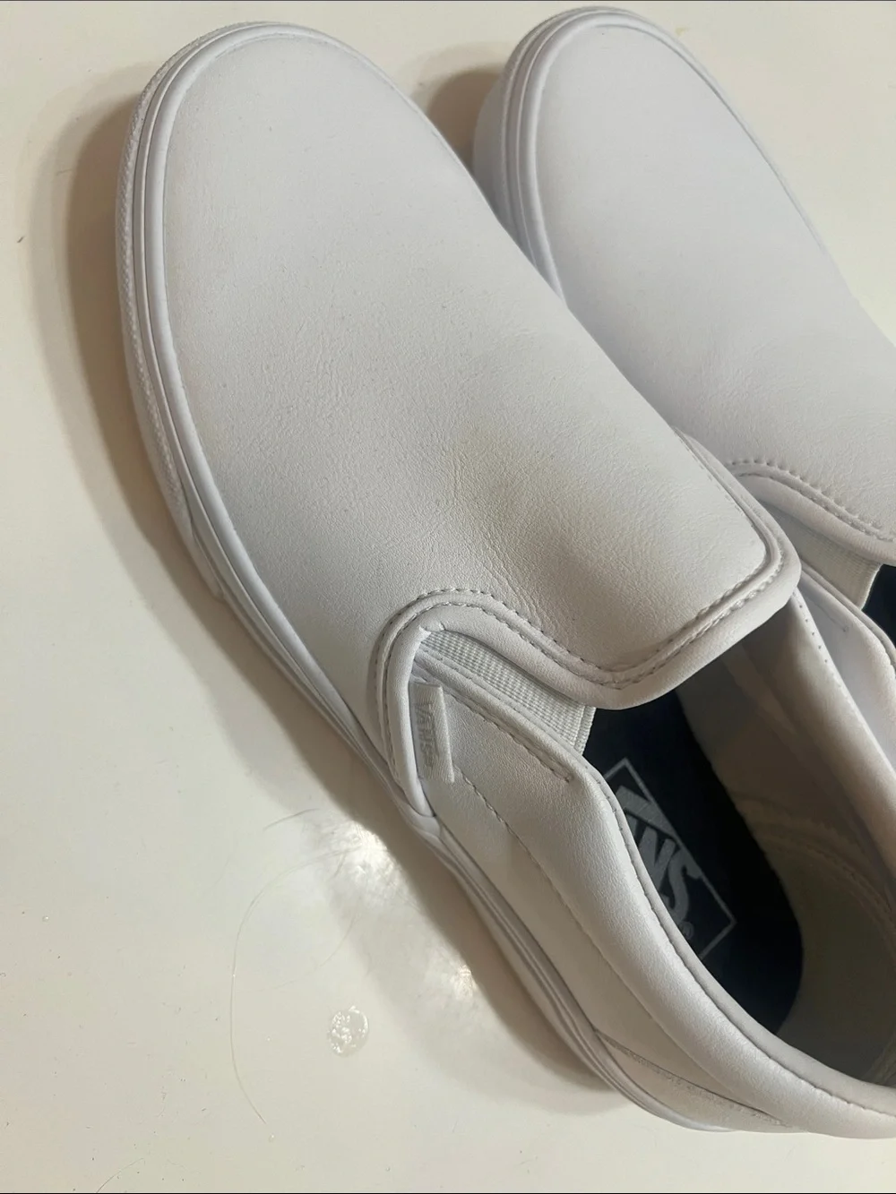Vans Men’s White Slip-On Loafers